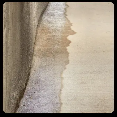 A concrete slab with a water stain