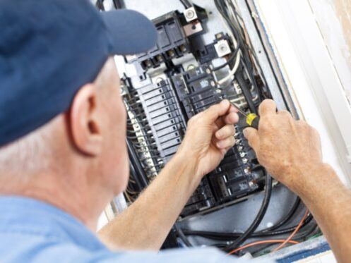 Electrician Upgrading Electric Panel in Dallas, TX